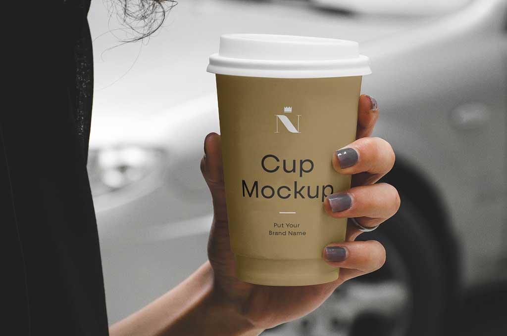 Woman Holding Coffee Cup Mockup